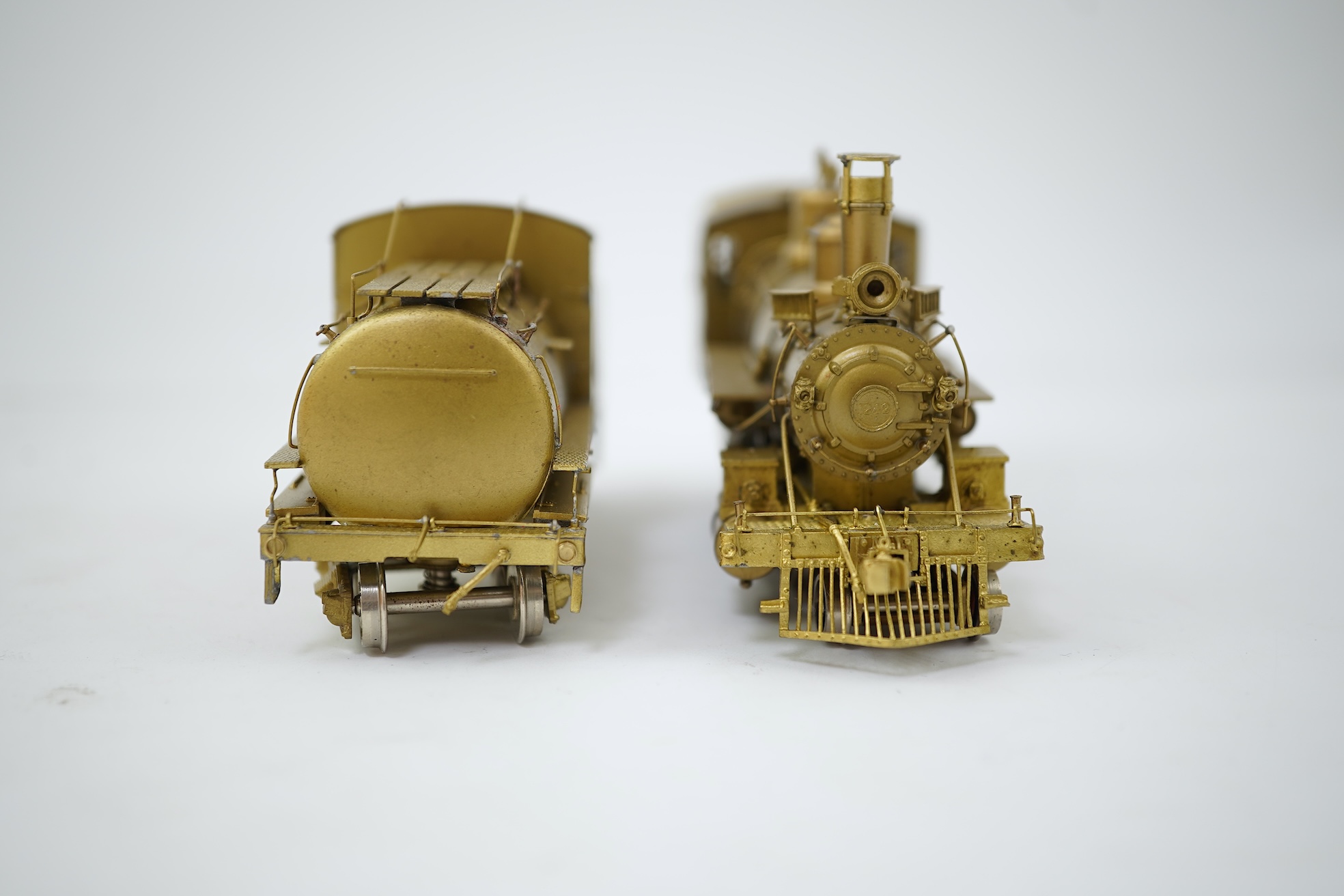A boxed HO gauge Sunset Models unpainted brass model of Union Pacific 1242 4-6-0 locomotive with bogie tender, powered for two rail operation.